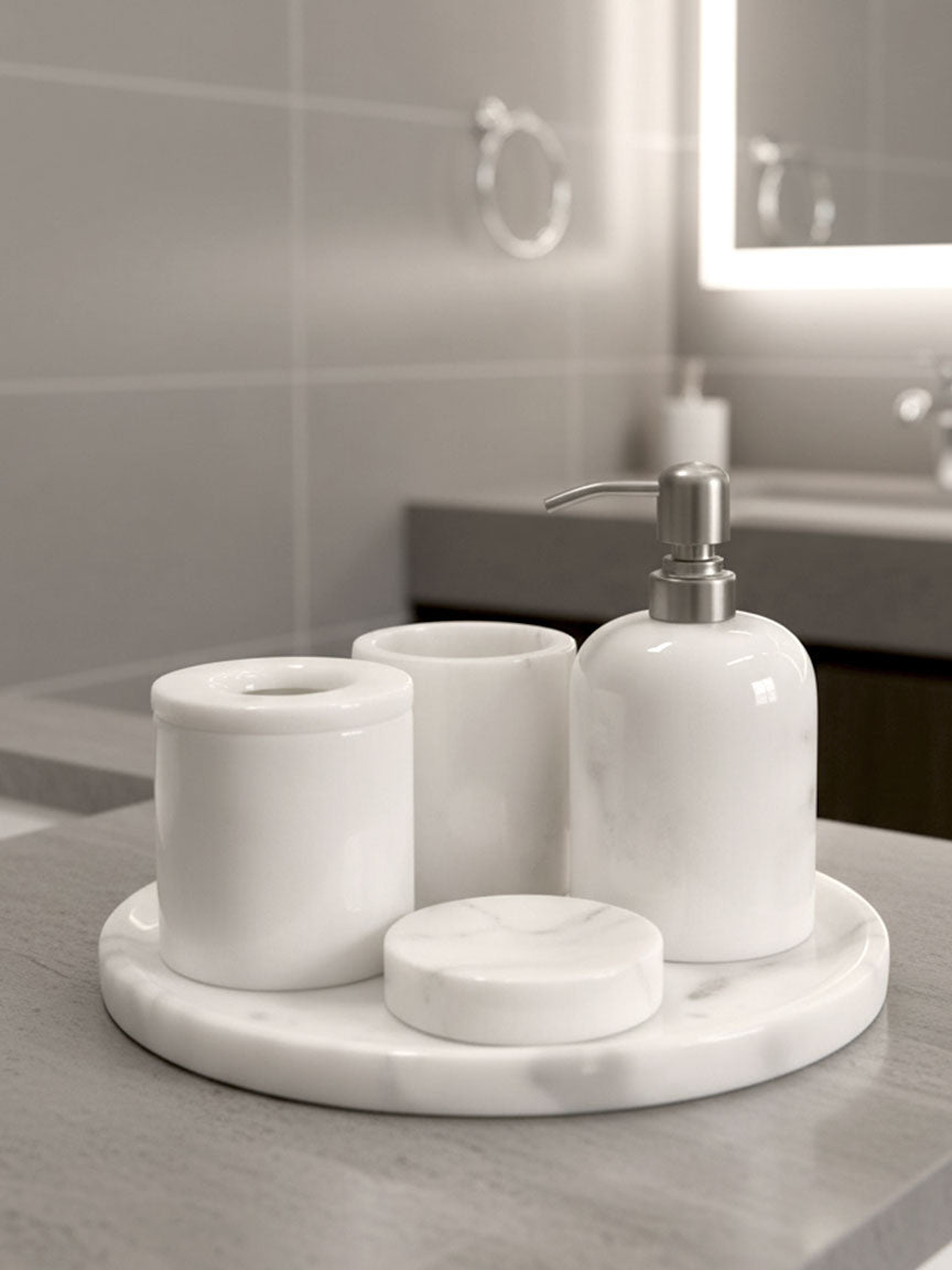 Luxury pearl white Afyon marble bathroom accessory set with silver accents displayed on a black marble countertop, featuring lotion dispenser, cotton box, toothbrush holder, soap dish, tray, waste basket, and toilet brush — handcrafted Turkish marble décor by Creative Home Designs,BAS-KRYKK-AFYON-PEARLSil-S5,BAS-KRYKK-AFYON-PEARLSil-S7