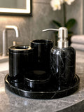 Luxury Toros black marble bathroom accessory set with silver accents displayed on a dark marble countertop, featuring lotion dispenser, cotton jar, toothbrush holder, soap dish, tray, waste basket, and toilet brush — handcrafted Turkish marble décor by Creative Home Designs,BAS-KRYKK-TOROS-BLASil-S7,BAS-KRYKK-TOROS-BLASil-S5
