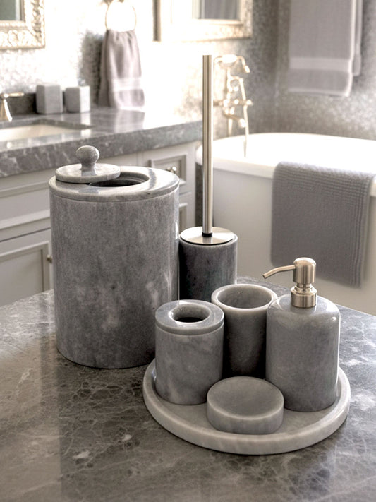 Luxury grey Afyon marble bathroom accessory set with gray accents displayed on a grey marble countertop, featuring lotion dispenser, cotton box, toothbrush holder, soap dish, tray, waste basket, and toilet brush — handcrafted Turkish marble décor by Creative Home Designs,BAS-KRYKK-AFYON-GRESil-S7,BAS-KRYKK-AFYON-GRESil-S5