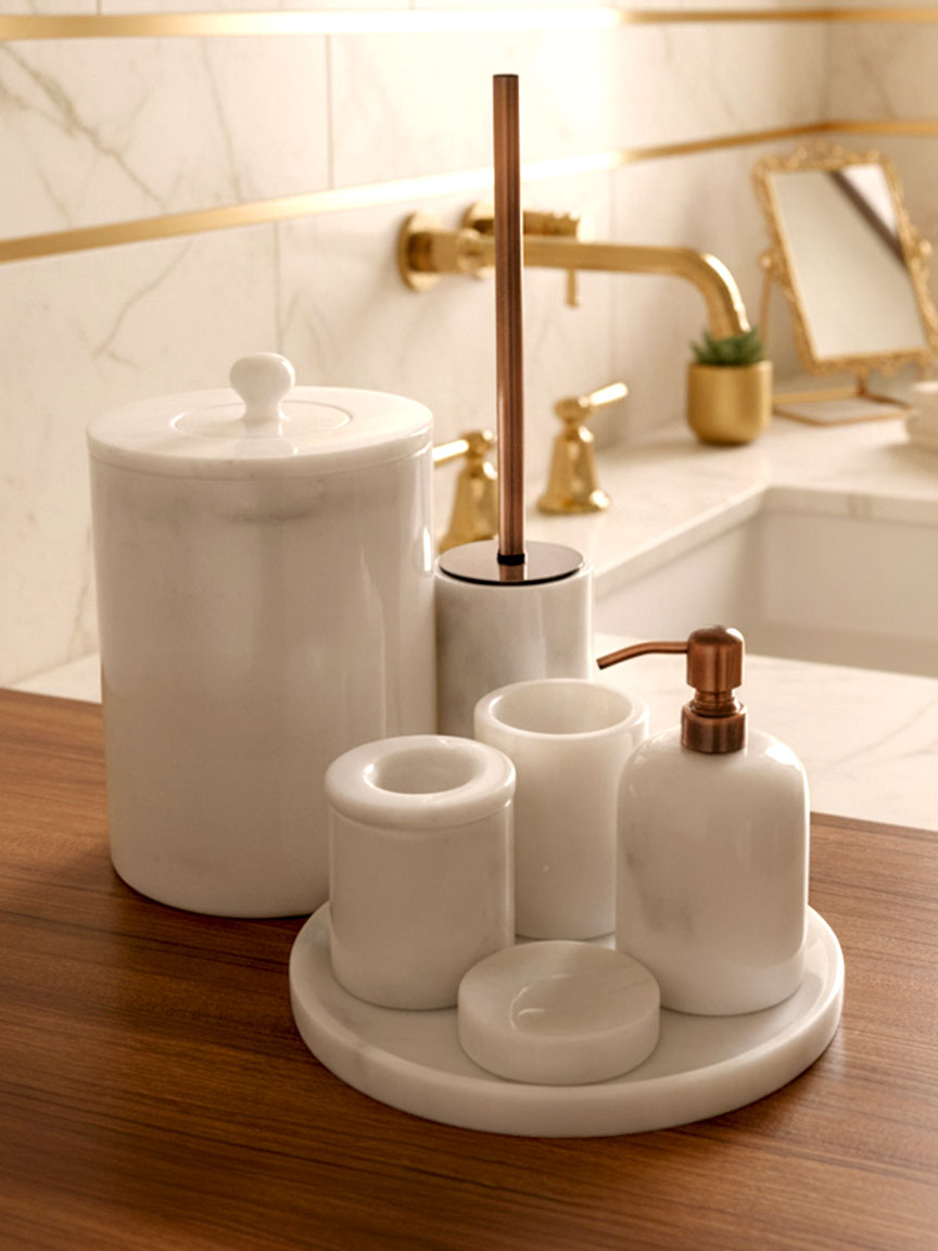 Luxury pearl white Afyon marble bathroom accessory set with copper accents displayed on a black marble countertop, featuring lotion dispenser, cotton box, toothbrush holder, soap dish, tray, waste basket, and toilet brush — handcrafted Turkish marble décor by Creative Home Designs,BAS-KRYKK-AFYON-PEARLCop-S7,BAS-KRYKK-AFYON-PEARLCop-S5