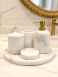 Luxury pearl white Afyon marble bathroom accessory set with gold accents displayed on a black marble countertop, featuring lotion dispenser, cotton box, toothbrush holder, soap dish, tray, waste basket, and toilet brush — handcrafted Turkish marble décor by Creative Home Designs,BAS-KRYKK-AFYON-PEARLGo-S7,BAS-KRYKK-AFYON-PEARLGo-S5