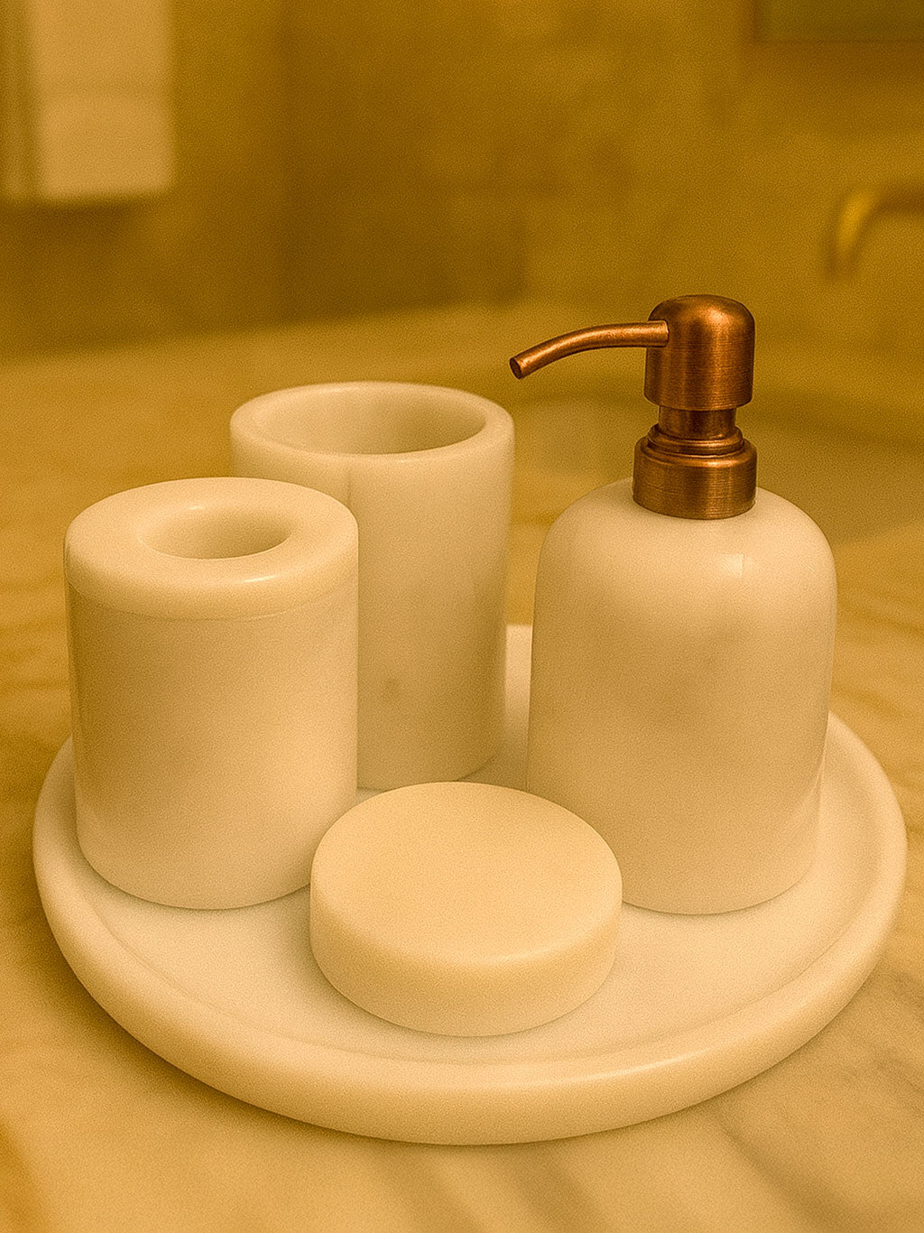 Luxury pearl white Afyon marble bathroom accessory set with copper accents displayed on a black marble countertop, featuring lotion dispenser, cotton box, toothbrush holder, soap dish, tray, waste basket, and toilet brush — handcrafted Turkish marble décor by Creative Home Designs,BAS-KRYKK-AFYON-PEARLCop-S7,BAS-KRYKK-AFYON-PEARLCop-S5