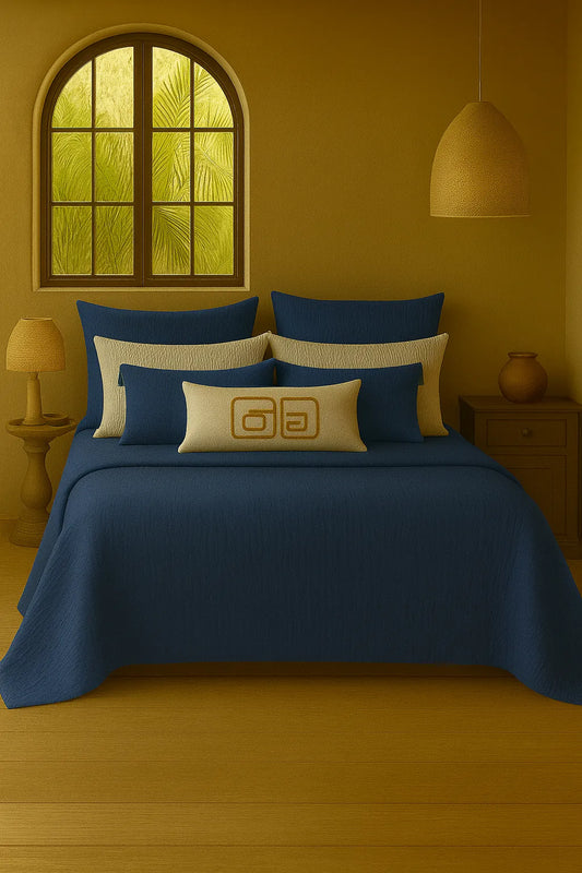 Luxury bedroom featuring a 100% muslin cotton Deep Blue gauze cloud blanket with matching pillows, styled on a bed beneath an arched window. BB-DesH-Blnkt-DeBlu-6070Price,BB-DesH-Blnkt-DeBlu-Tw,BB-DesH-Blnkt-DeBlu-Q,BB-DesH-Blnkt-DeBlu-K,BB-DesH-Blnkt-DeBlu-100118,BB-DesH-Blnkt-DeBlu-100125
