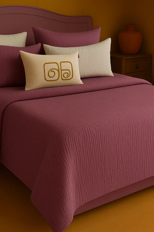 Luxury bedroom featuring a 100% muslin cotton Damson gauze cloud blanket with matching pillows, styled on a bed beneath an arched window. BB-DesH-Blnkt-Dmsn-6070Price,BB-DesH-Blnkt-Dmsn-Tw,BB-DesH-Blnkt-Dmsn-Q,BB-DesH-Blnkt-Dmsn-K,BB-DesH-Blnkt-Dmsn-100118,BB-DesH-Blnkt-Dmsn-100125
