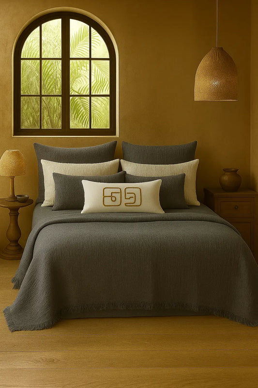 Luxury bedroom featuring a 100% muslin cotton gray gauze cloud blanket with matching pillows, styled on a bed beneath an arched window. BB-DesH-Blnkt-Gra-6070,BB-DesH-Blnkt-Gra-Tw, BB-DesH-Blnkt-Gra-Q,BB-DesH-Blnkt-Gra-K,BB-DesH-Blnkt-Gra-100118,BB-DesH-Blnkt-Gra-100125