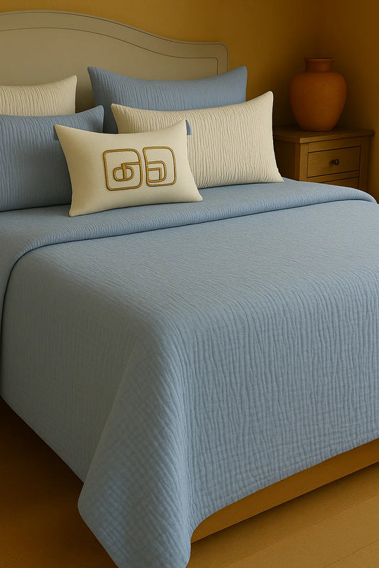 Luxury bedroom featuring a 100% muslin cotton Sky Blue gauze cloud blanket with matching pillows, styled on a bed beneath an arched window. BB-DesH-Blnkt-SkBlu-6070,BB-DesH-Blnkt-SkBlu-Tw,BB-DesH-Blnkt-SkBlu-Q,BB-DesH-Blnkt-SkBlu-K,BB-DesH-Blnkt-SkBlu-100118,BB-DesH-Blnkt-SkBlu-100125