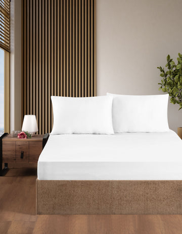 Creative Home Bed Sheets Fitted Sheet Set including 1 Fitted Sheet 2 Pillowcases 3 pcs Set - White bed sheets on a bed in a bedroom with a lamp and plant, BS-FC-FSS-White-Q,BS-FC-FSS-White-K